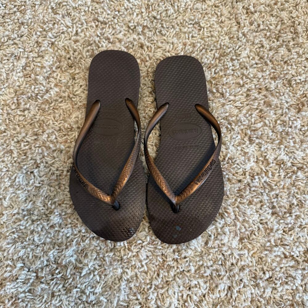 Brown Havaianas flip flops